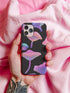 Aesthetic phone case featuring pastel neon mushrooms on a black background. The botanical-inspired design is available for iPhone, Samsung, and Google Pixel models. Glossy or matte finish options with durable, dual-layer protection.